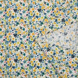 Voile de coton imprimé digital petites fleurs aquarelle jaune et bleu sur fond blanc