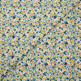 Voile de coton imprimé digital petites fleurs aquarelle jaune et bleu sur fond blanc
