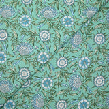Popeline de coton imprimé digital floral bohème bleu fond vert d'eau