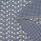 Algodón Vichy bordado fondo azul marino