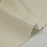Gabardine 100% coton symbole et soleil fond blanc cassé