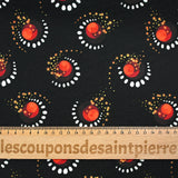 Gabardine de laine mélangée imprimée éclipse orange fond noir