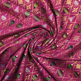 Cotton poplin printed with gold diamonds, moons and stars on a purple background