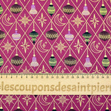 Cotton poplin printed with gold diamonds, moons and stars on a purple background
