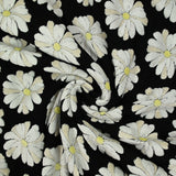 Jersey de coton imprimé marguerite éponge en relief fond noir