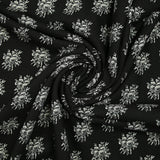 Jersey de viscose imprimé médaillon de fleurs grises fond noir