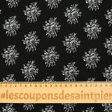 Jersey de viscose imprimé médaillon de fleurs grises fond noir