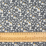 Viscose imprimée fleurs blanches et jaunes fond gris anthracite