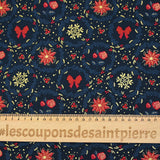 Cotton poplin printed with poinsettias and red bows on a navy blue background