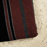 100% felted wool rust and gray stripe black background