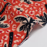 Double gauze printed wild palm tree orange background