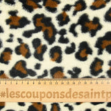 Fondo beige de piel de leopardo sintética