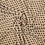 Maille polyviscose floquée pois noir fond chair