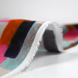 Viscose imprimée graphiquement floue rose et violet fond argile