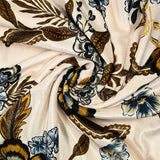 Short velvet jersey with black and brown flower print, ivory background