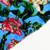 Maille velours imprimé botanique fond bleu turquoise