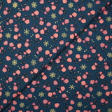 Cotton poplin printed with coral roses and gold flakes on a steel blue background