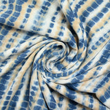 Voile polycoton imprimé ossement bleu et beige fond blanc