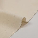 Toile de coton mouchetée écrue