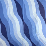 Popeline de coton imprimée vagues camaïeu de bleu