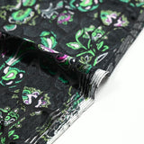 Jersey velours dévoré animal imprimé cachemire vert fond noir