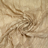 Voile de polyester froissé et brodé fleurs fond beige