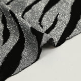 Maille lurex zèbre argent fond noir