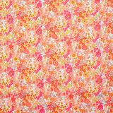 Coton imprimé Matilde fleurs mandarine et rose au mètre