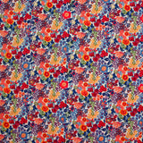 Coton imprimé Matilde fleurs orange et bleu au mètre