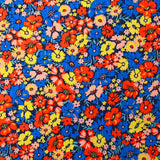 Crépon viscose rayé lurex argent Camellia bleu et rouge fond marine