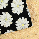 Jersey de coton imprimé marguerite éponge en relief fond noir