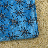Jersey de velours lurex étoile des mers fond bleu