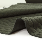 Matelassé matelassé braids military green background