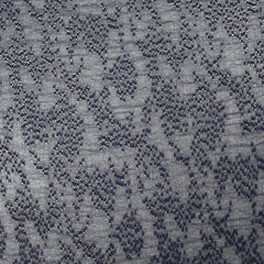 Mousseline plumetis impression argent parsemé fond marine