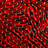 Plissé polyester imprimé écorce et losange doré fond rouge