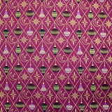 Cotton poplin printed with gold diamonds, moons and stars on a purple background