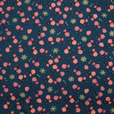 Cotton poplin printed with gold diamonds, moons and stars on a purple background