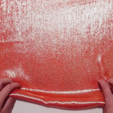 Iridescent crêpe orange background