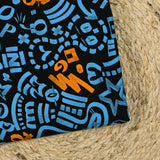 Sergé de coton imprimé graffitis bleu et orange fond noir