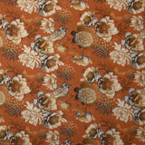Viscose imprimée chrysanthèmes fond orange brûlé