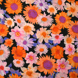 Viscose imprimée invasion florale fond noir