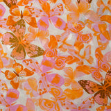 Viscose imprimée jacquard papillons lilas et orange fond blanc
