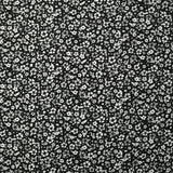 Viscose imprimée myriade de fleurs gris et blanc fond noir
