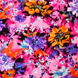 Viscose imprimée nuage de fleurs fond rose