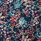 Viscose imprimée pensée animale corail et turquoise fond marine