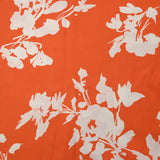 Viscose imprimée silhouette florale fond orange