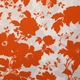 Viscose imprimée silhouettes de fleurs orange fond blanc