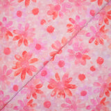 Voile 100% coton Plumetis imprimé marguerite corail fond rose 