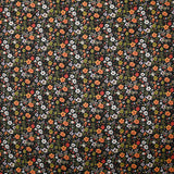 Voile de coton imprimé digital prairie de petites fleurs vert et orange sur fond noir