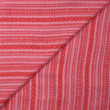 Voile de viscose et laine imprimé aztèque rouge fond rose